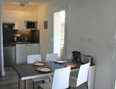 Cuisine ou kitchenette dans l'établissement Ambiance Cosy Capbreton