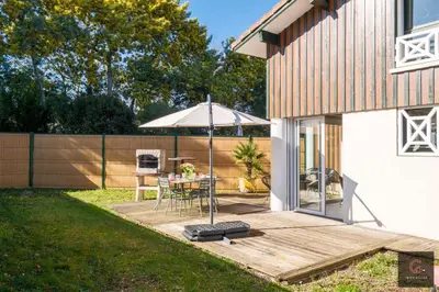 Jardin de l'établissement Maison de vacances à Biscarrosse lac pour 6 personnes