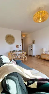 Coin salon dans l'établissement LE NID DU TEICH Duplex COSY ET CENTRAL A 5 MINUTES DE LA GARE