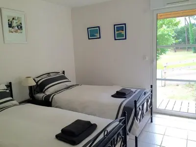 Un ou plusieurs lits dans un hébergement de l'établissement Villa 5 bedrooms 4 bathrooms large swimming pool
