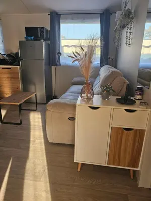 Cuisine ou kitchenette dans l'établissement Mobilehome cosy