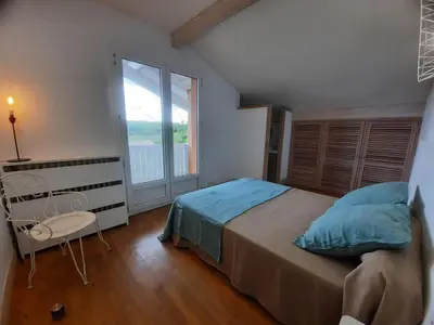 Un ou plusieurs lits dans un hébergement de l'établissement Villa de Campagne au bord de l'Adour