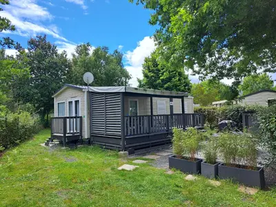 Jardin de l'établissement Le Cozy'Land - Mobilhome Camping La Réserve