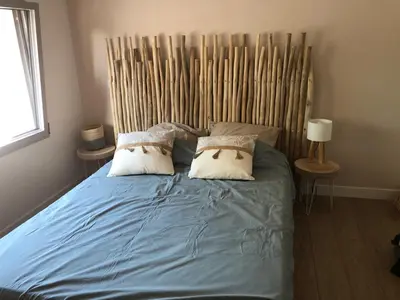 Un ou plusieurs lits dans un hébergement de l'établissement Maison 6 à 8 pers au bord du Lac de Biscarrosse