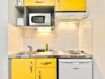 Cuisine ou kitchenette dans l'établissement Le Terrazzo - Élégant - Centre - Balcon - Lumineux