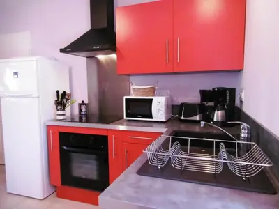 Cuisine ou kitchenette dans l'établissement La dugue sud