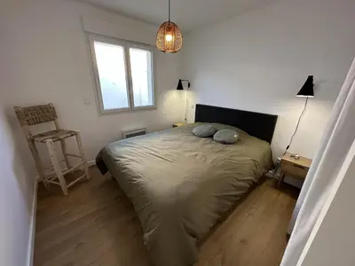 Un ou plusieurs lits dans un hébergement de l'établissement La villa caroline