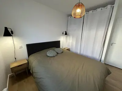 Un ou plusieurs lits dans un hébergement de l'établissement La villa caroline