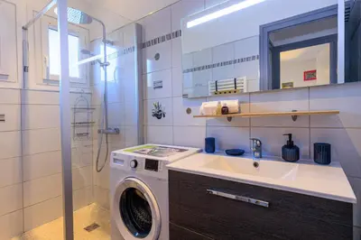 Salle de bains dans l'établissement Maison des Bonheurs Océaniques - Welkeys