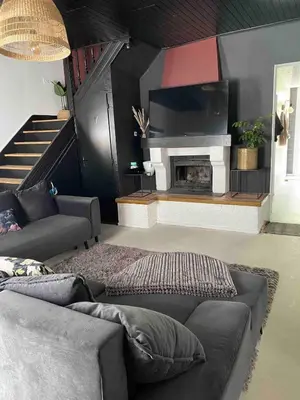 Coin salon dans l'établissement Maison familiale de charme