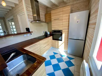 Cuisine ou kitchenette dans l'établissement St THOMAS