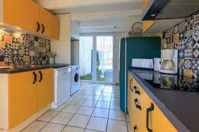 Cuisine ou kitchenette dans l'établissement Maison Aturine - Welkeys