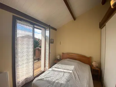 Un ou plusieurs lits dans un hébergement de l'établissement Villa patio proche du port