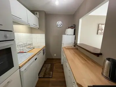 Cuisine ou kitchenette dans l'établissement Superbe appartement très spacieux en centre ville