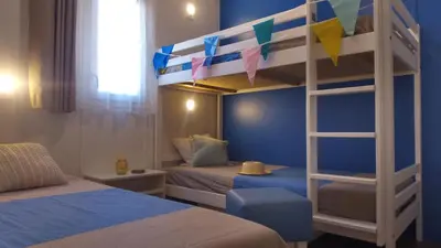Un ou plusieurs lits dans un hébergement de l'établissement VVF Landes Moliets