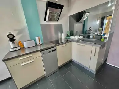 Cuisine ou kitchenette dans l'établissement Appartement Seignosse bord de plage