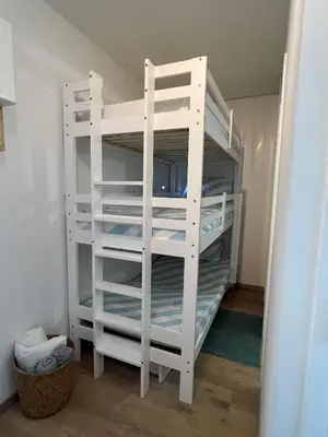Un ou plusieurs lits dans un hébergement de l'établissement Studio cosy au porte de l ocean