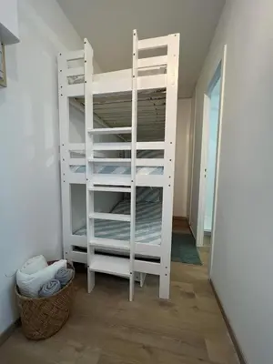 Un ou plusieurs lits dans un hébergement de l'établissement Studio cosy au porte de l ocean