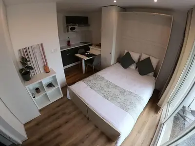 Un ou plusieurs lits dans un hébergement de l'établissement La villa baie du lac les pins