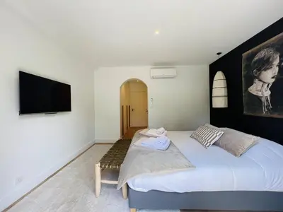 Un ou plusieurs lits dans un hébergement de l'établissement Spacieuse Villa à Hossegor Avec Piscine Chauffée - FR-1-791-36