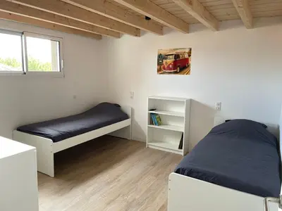 Un ou plusieurs lits dans un hébergement de l'établissement Villa Sur La Dune Moliets, 12 people, beach, golf