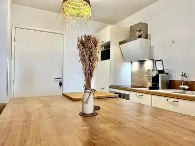 Cuisine ou kitchenette dans l'établissement Appartement plage et lac