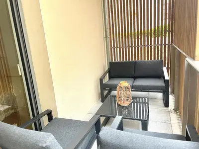Coin salon dans l'établissement Appartement plage et lac