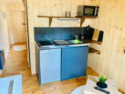 Cuisine ou kitchenette dans l'établissement Roulotte atypique à l'Océan