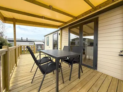 Balcon ou terrasse dans l'établissement MobilHome de la Coccinelle