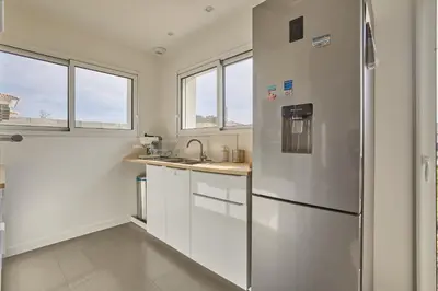 Cuisine ou kitchenette dans l'établissement Maëva - Proche des Plages