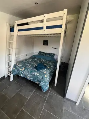 Un ou plusieurs lits dans un hébergement de l'établissement Chambre d'hôtes