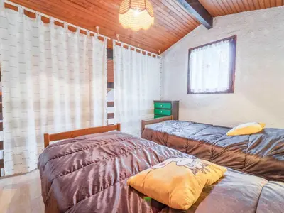 Un ou plusieurs lits dans un hébergement de l'établissement Maisonnette à Mimizan Plage, 6 Pers, Proche Océan, Parking Inclus - FR-1-50-167