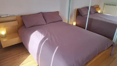 Un ou plusieurs lits dans un hébergement de l'établissement Casa Enolla