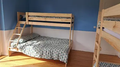 Un ou plusieurs lits dans un hébergement de l'établissement Casa Enolla