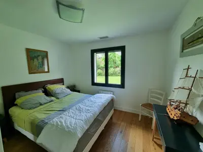 Un ou plusieurs lits dans un hébergement de l'établissement house with heated pool and jacuzzi