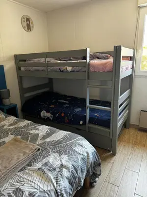 Un ou plusieurs lits dans un hébergement de l'établissement Maisonnette au calme, T3, 6 pers résidence avec piscine et wifi privée proche lac et océan