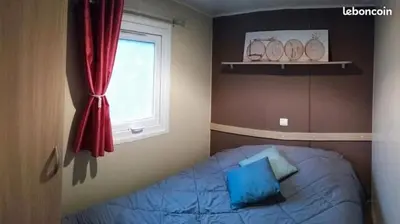 Un ou plusieurs lits dans un hébergement de l'établissement MH 387 3 chambres 1 salle de bain dans camping 4 étoiles