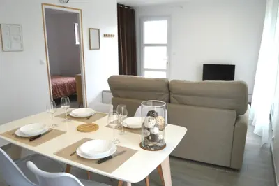 Coin salon dans l'établissement Petite maison de plain-pied