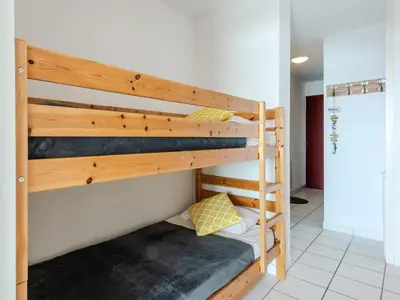 Un ou plusieurs lits dans un hébergement de l'établissement Apartment Les Pêcheurs-7 by Interhome