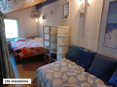 Un ou plusieurs lits dans un hébergement de l'établissement Villa Capbreton proche plage résidence avec piscine