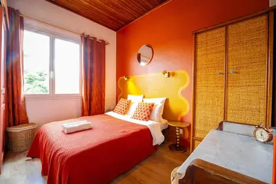 Un ou plusieurs lits dans un hébergement de l'établissement Au Bon Landais Surf Hôtel
