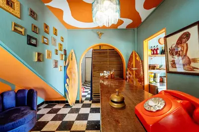 Coin salon dans l'établissement Au Bon Landais Surf Hôtel