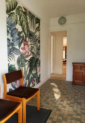 Coin salon dans l'établissement Grand T3 rénové - Calme Jardin Parking Wifi proche DAX