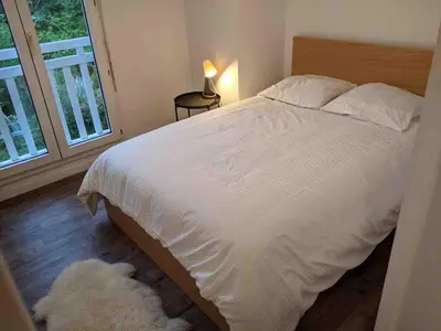 Un ou plusieurs lits dans un hébergement de l'établissement Capbreton 2 bedroom apartment between forest and beach