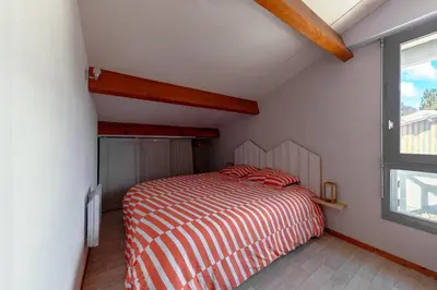 Un ou plusieurs lits dans un hébergement de l'établissement Villa 13 - En duplex jardin privé à 400m du lac