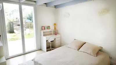 Un ou plusieurs lits dans un hébergement de l'établissement Maison entre forêt et océan - piscine et tennis
