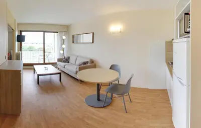 Coin salon dans l'établissement Residence Les Chenes