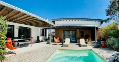 Piscine de l'établissement Villa classée 5 étoiles 200m de la plage piscine chauffée 5 vélos ou située à proximité