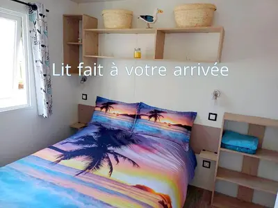 Un ou plusieurs lits dans un hébergement de l'établissement MOBIL HOME à SEIGNOSSE dans les Landes près de la mer