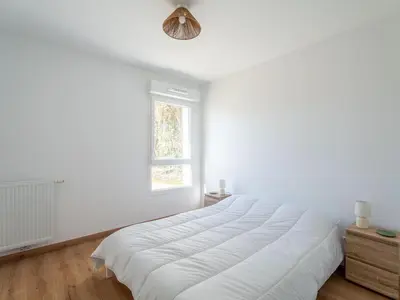 Un ou plusieurs lits dans un hébergement de l'établissement Appartement T4 lumineux à Biscarrosse - 6 à 8 pers. - Parking inclus - FR-1-319-599